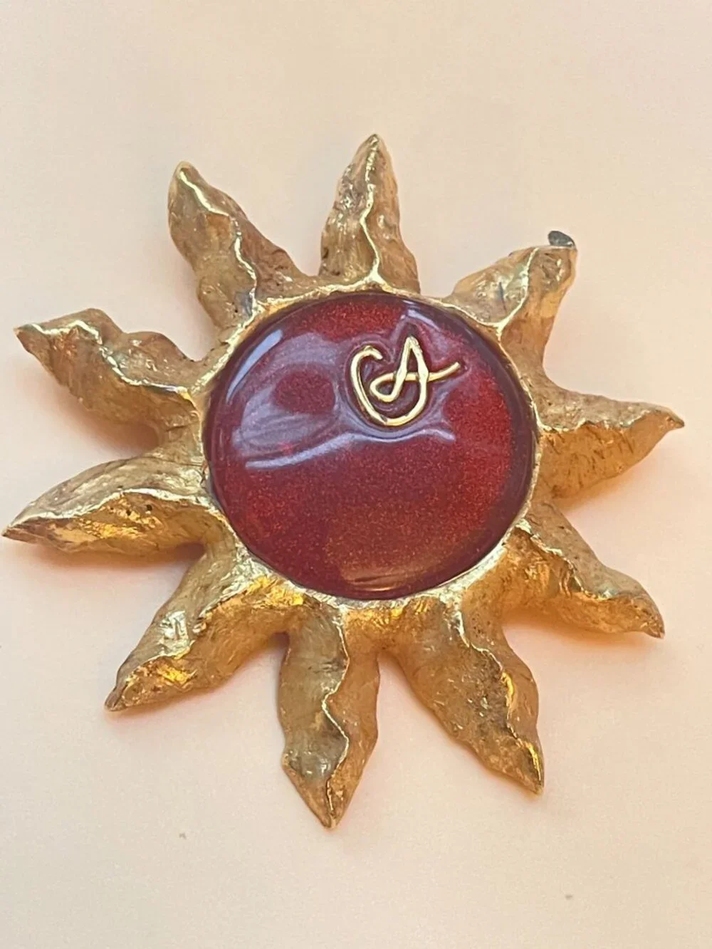 Christian Lacroix Gold-Tone Sun Brooch W/ Red Resin Center & Golden Logo